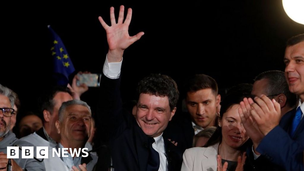 Huge challenges await new president of divided Romania