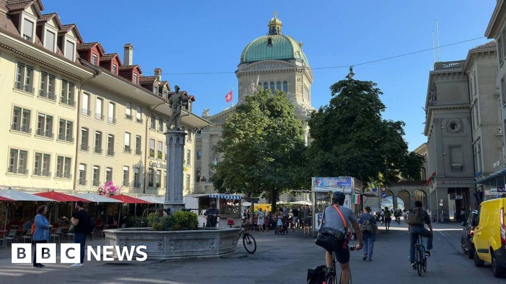 Swiss voters narrowly approve plan to introduce digital IDs