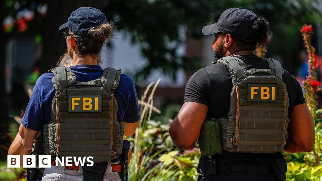 FBI fires agents pictured kneeling at George Floyd protest, US media reports