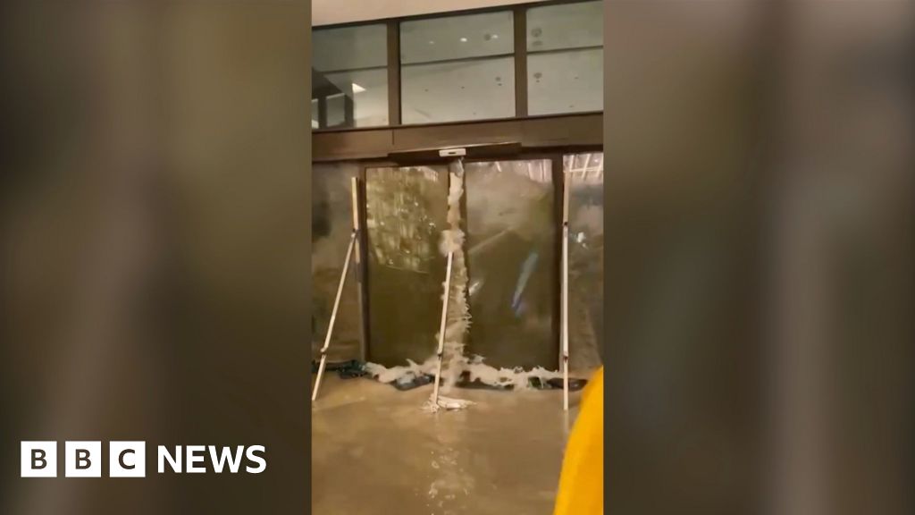 Social media footage shows water smashing through Hong Kong hotel